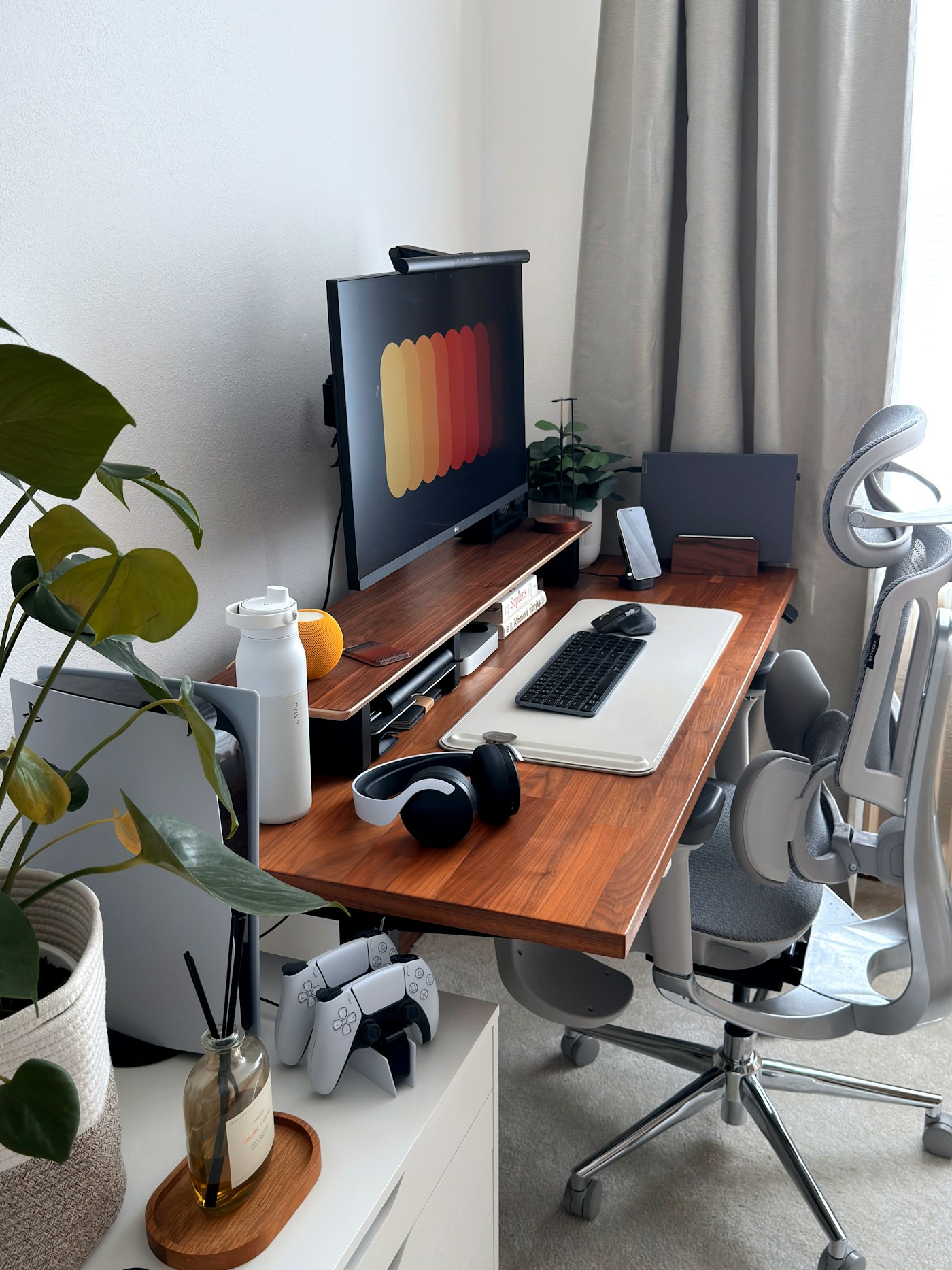 Calm modern home office with a desk, computer, and warm natural details